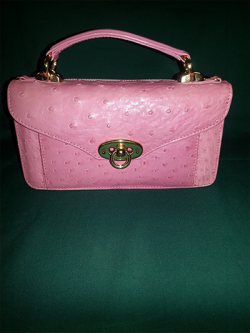 pink crocodile purse